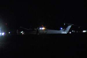 Small plane slid off the S.A. International Airport runway on Friday night