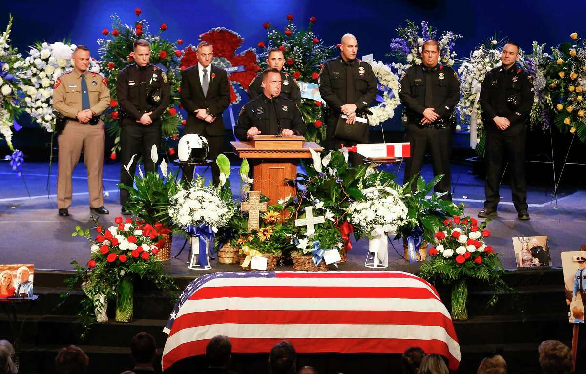Friends and colleagues of Houston Police Officer Jason Knox, speak during his funeral at Houston's First Baptist Church on Saturday, May 9, 2020.