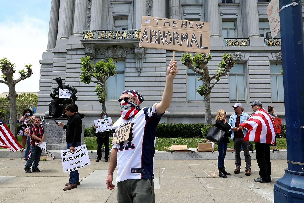 The Cuz protests during a rally in front of City Hall calling for Gov. Newsom to immediately reopen California completely in San Francisco, Calif., on Saturday, May 9, 2020. Protesters argued they've been stripped of their rights.
