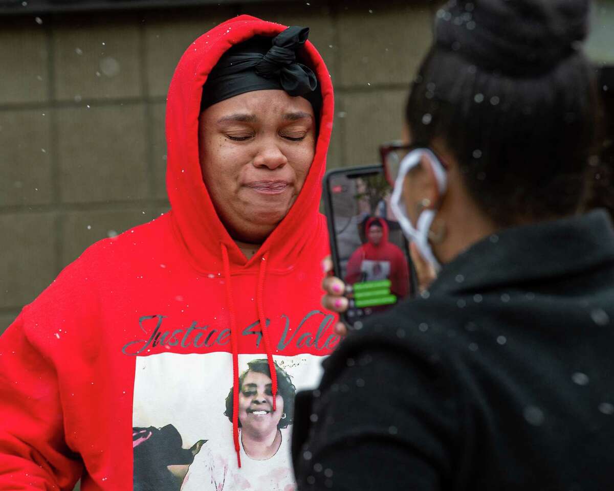 Christina Shepherd is overcome with emotion during a memorial for Valena Shepherd organized by Urban Grief outside of 1 Lincoln Square on Saturday, May 9 2020 in Albany NY. Shepherd was murdered inside the Morton Avenue apartment building on Jan. 5 (Jim Franco/Special to the Times Union.)