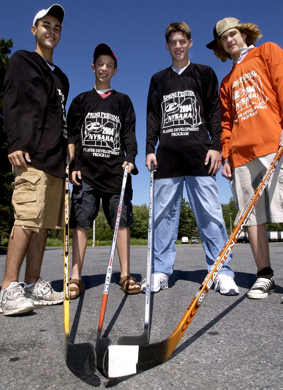 TIMES UNION STAFF PHOTOS by WILL WALDRON Left to right, Chris Connors, Lukas First, Brian Lashoff, and Dylan Robichaud, are going to an elite hockey camp, sponsored by USA Hockey, in Rochester next month, Saturday June 26, 2004.