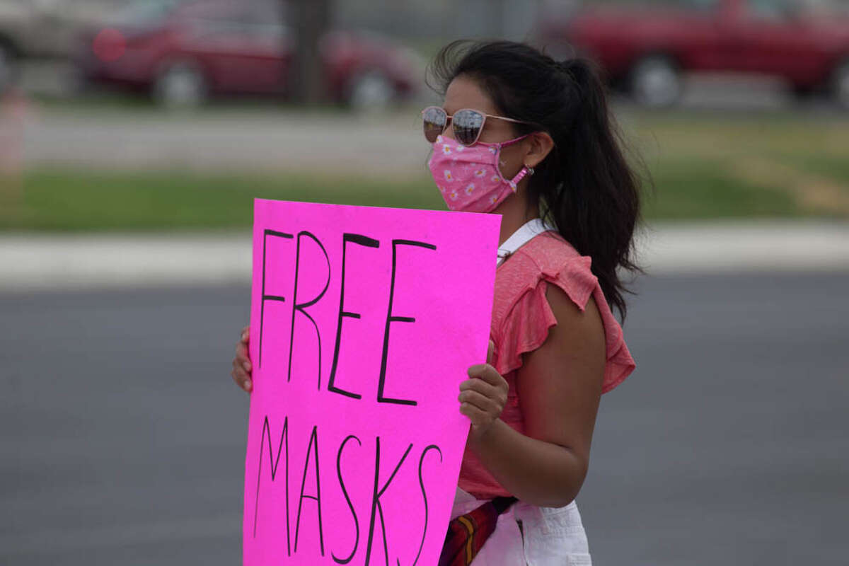 Elizabeth 'Liz' Campos and her supporters held a mask giveawya on Saturday at El Patio Taqueria in Converse.