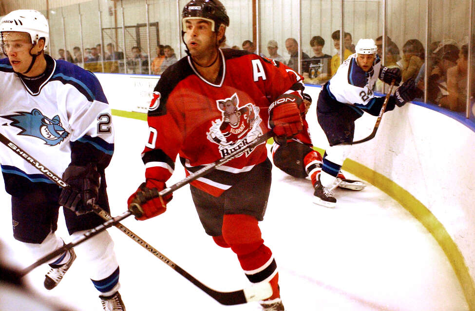 TIMES UNION STAFF PHOTO WILL WALDRON--River Rats Center, Craig Darby, center, during a preseason game against the Worcester Icecats at B.I.G. Arena in Delmar. Sunday October 6, 2002.