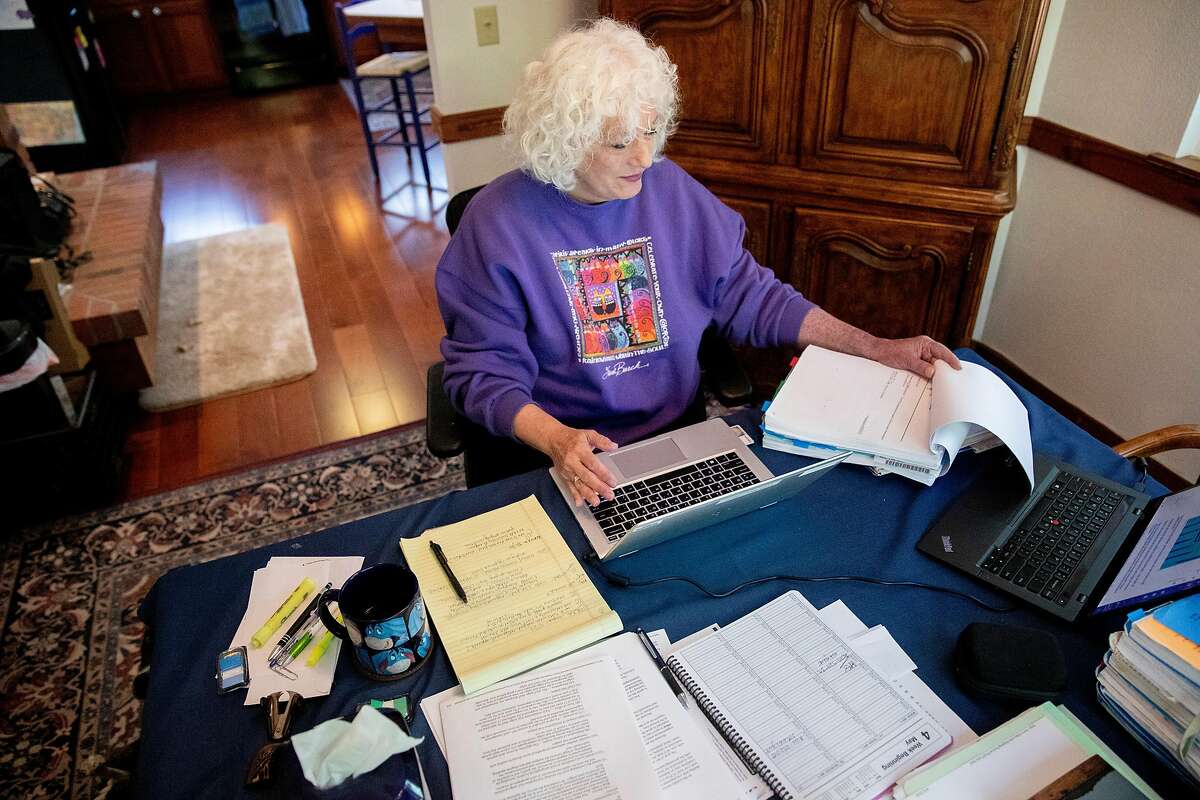 Judge Dana Leigh Marks works from her dining room at her home in Mill Valley, Calif. Wednesday, May 6, 2020. Immigrant advocates say the precise policies this administration has pursued will make it all the more difficult to get the courts back to functioning efficiently, potentially pushing hundreds of thousands of cases off for years.
