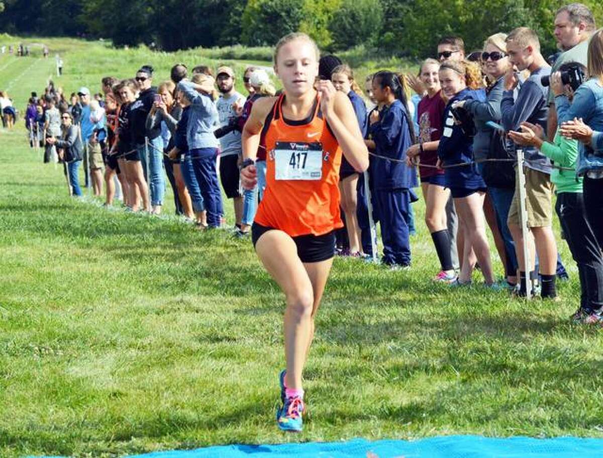 Edwardsville runner Abby Schrobilgen wins the girls’ race of the Tiger Classic at the SIUE cross country course.