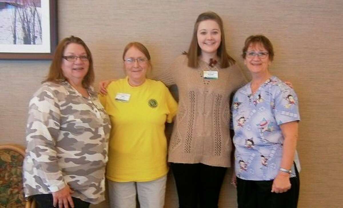 From left, Suzette (activity aide), Deb (activity aide), Aubrey Mielens, and Agnes (activity aide) at Stratford Pines Nursing & Rehab. (Photo provided)