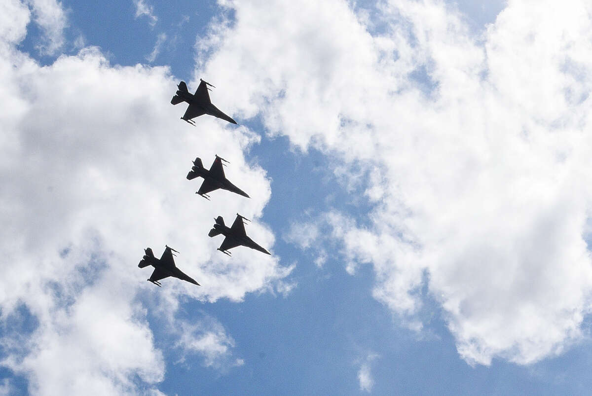 The Air National Guard's 149th Fighter Wing, consisting of four F-16s, is greeted by community members and first responders, Monday, May 11, 2020, as the planes fly over Laredo Medical Center as a tribute to frontline workers.