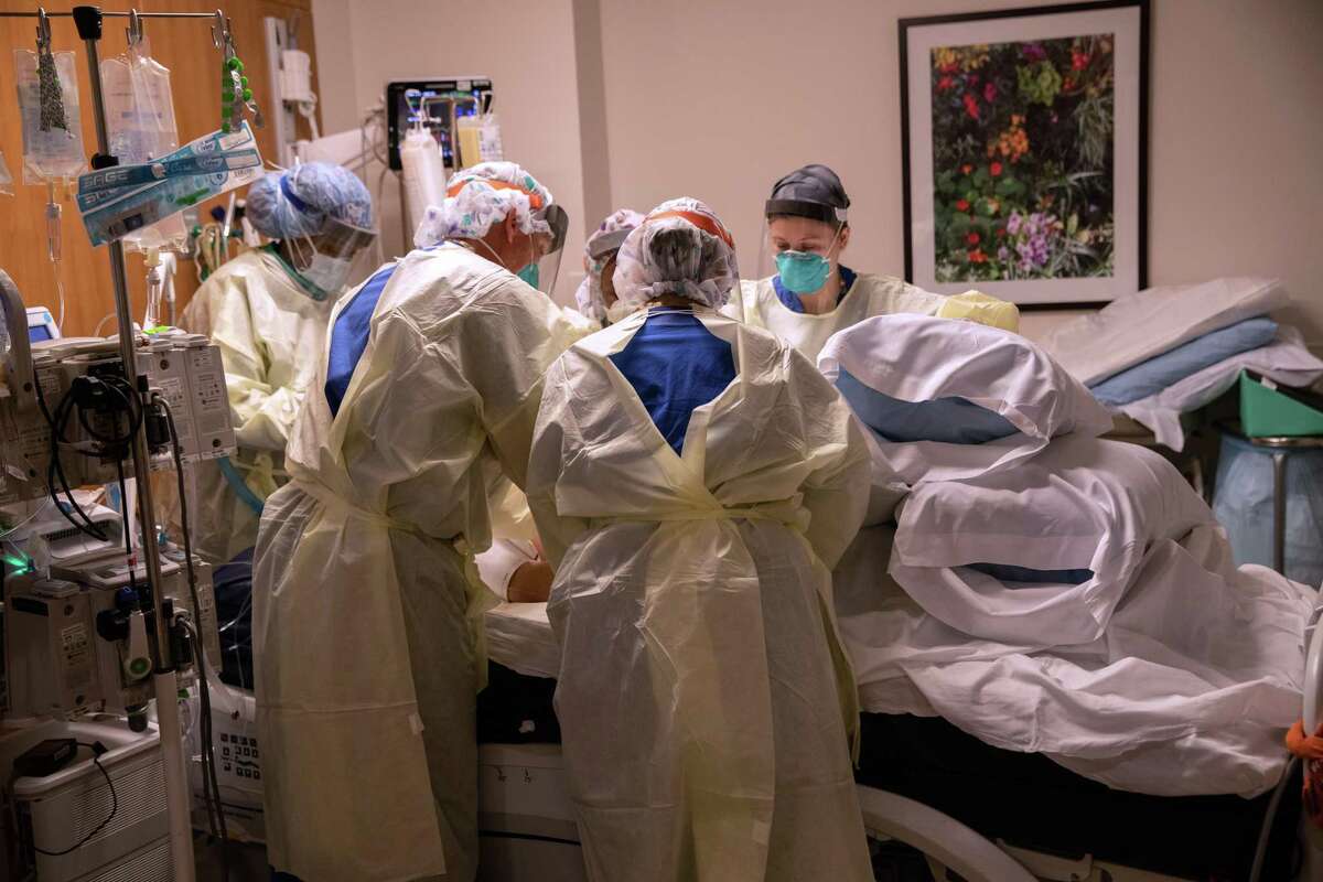An intensive care unit team wearing personal protective equipment, is shown in a recent photo from Stamford Hospital.