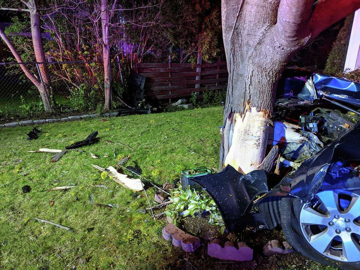 Driver crashes car into tree in New Fairfield; refuses treatment