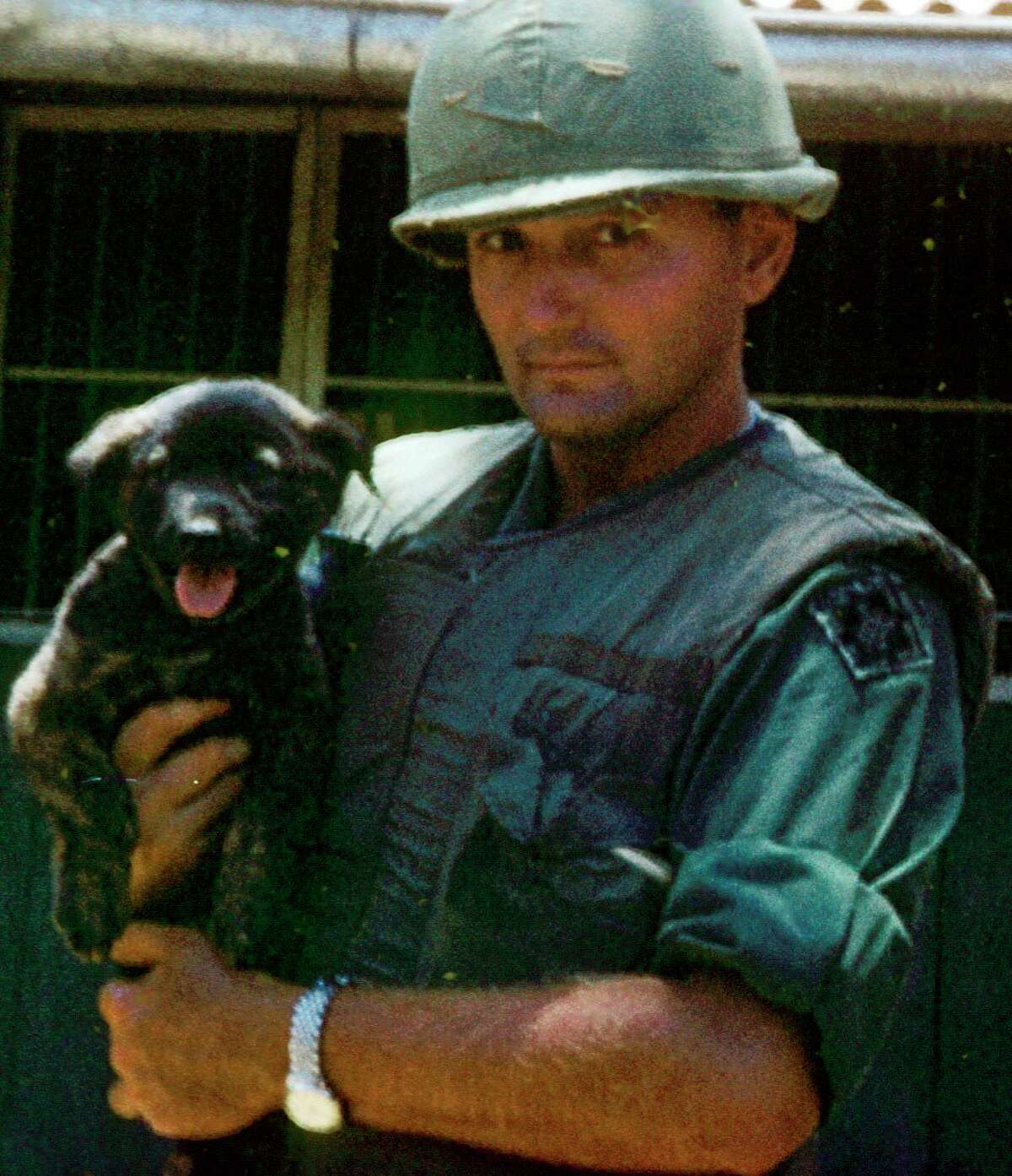 This is Builder, the puppy rescued after a mortar attack in Rach Kein made him an orphan. Captain Michael Miller adopted Builder and they were inseparable. Builder saved the captain's life in a mortar attack. (Photo provided)