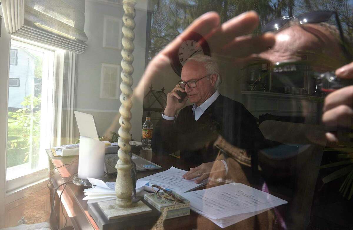 First Selectman Rudy Marconi works at his home. Marconi has been working from home since being diagnosed with COVID-19 over a month ago. Tuesday, May 12, 2020, in Ridgefield, Conn.