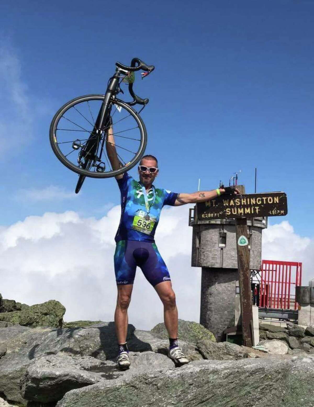 Robert Hurd, owner of Snap Fitness Portland, rode to the top of Mt. Washington in New Hampshire in August 2017. It was the first time he did so after he was hit by a car in Middletown while cycling, causing great injury and trauma.