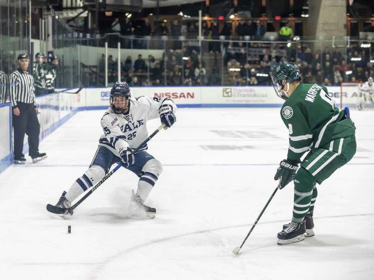 Greenwich’s Phil Kemp, left, will be the next captain for the Yale men’s hockey team.