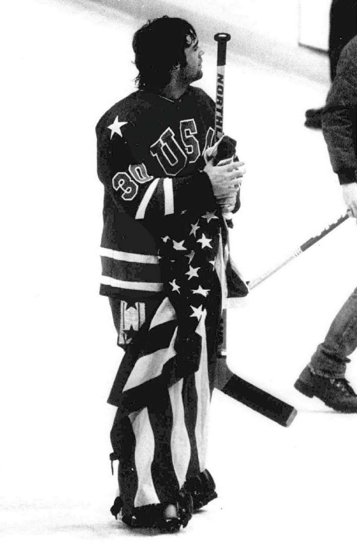 U.S. goalie Jim Craig holds the American flag after winning the gold medal at the 1980 Olympics.
