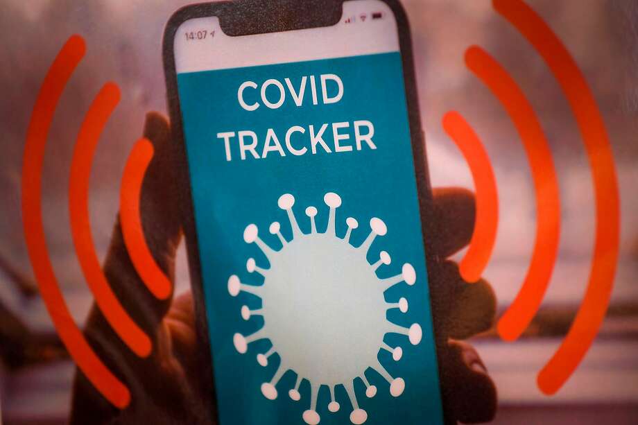 A logo reading 'Covid tracker' is pictured in a call centre dedicated to 'contact tracing', where phonecalls are made to map how many people in Brussels have contracted the Covid-19, on May 8, 2020 in Brussels, amid the COVID-19 outbreak caused by the novel coronavirus. (Photo by LAURIE DIEFFEMBACQ / BELGA / AFP) / Belgium OUT (Photo by LAURIE DIEFFEMBACQ/BELGA/AFP via Getty Images) Photo: Laurie Dieffembacq / Belga / AFP Via Getty Images