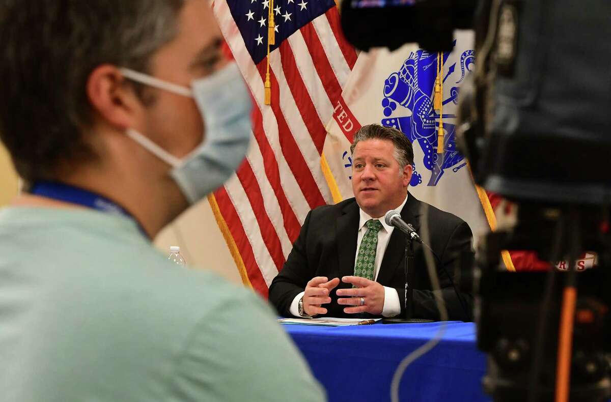 Albany County Executive Dan McCoy, right, speaks at his daily press conference to discuss the latest COVID-19 information on Wednesday, May 13, 2020 in Albany, N.Y. (Lori Van Buren/Times Union)
