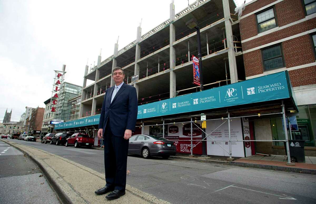John DiMenna, President of Seaboard Properties, poses for a photo in front of the company's project on Atlantic Street in Stamford, Conn., on Tuesday, November 25, 2014.