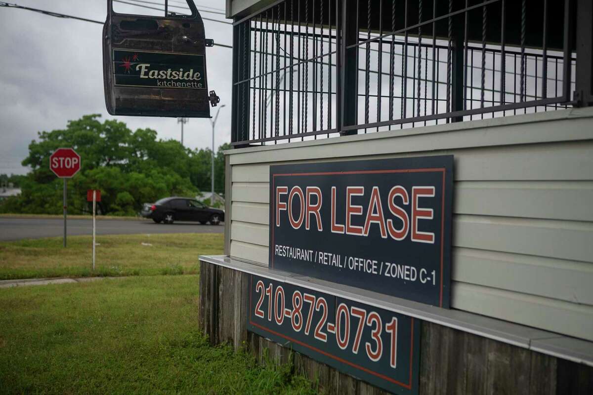 “For lease” signs hang outside of the now closed Eastside Kitchenette in San Antonio on May 12, 2020. The restaurant was not been able to stay open without dine-in customer support. Since mid-March, when the pandemic set off an economic crisis, more than 12 percent of the Bexar County workforce has filed for unemployment benefits. Job losses in Texas have been concentrated in service-oriented industries staffed largely with low-wage workers, such as retail and hospitality.