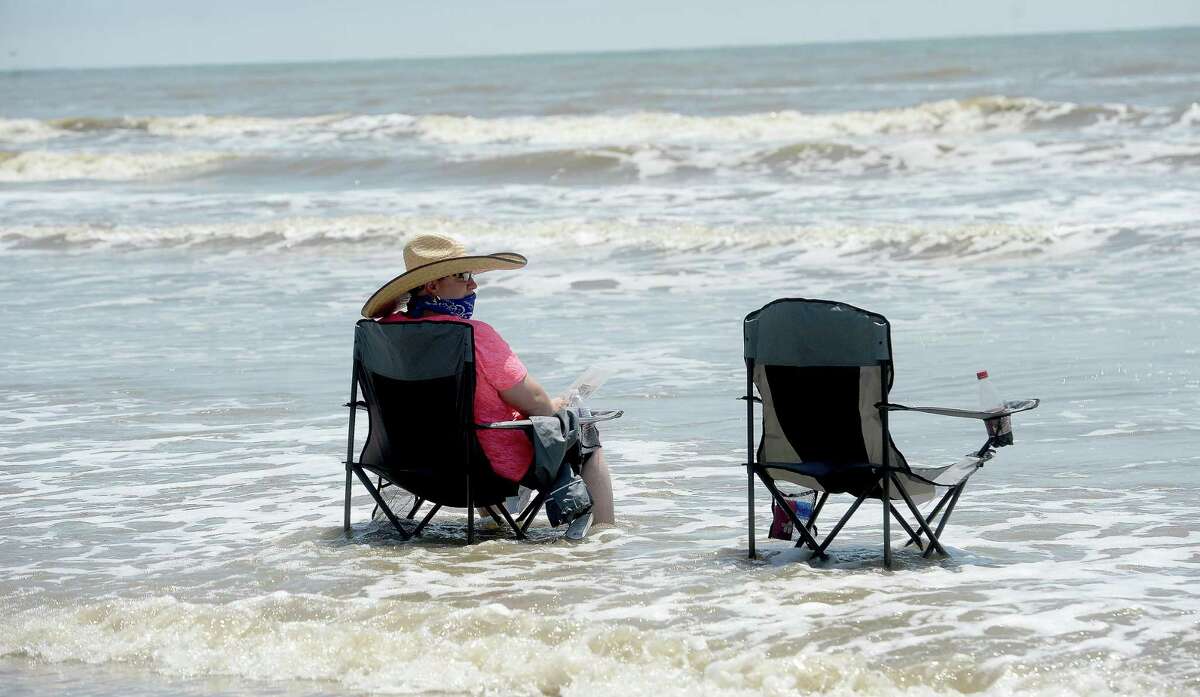 Relaxing in the surf at Sea Rim State Park. Click through this slide show to see parks within driving distance of Beaumont.