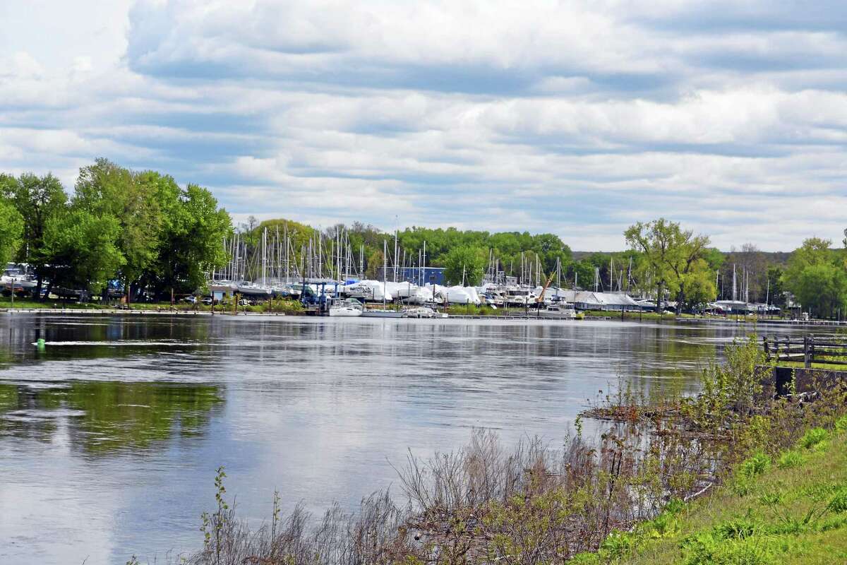 The Connecticut River flows past Portland marina as seen from the vantage point of River Road in Middletown. The body of a Hartford man was discovered in the water in Portland this week.