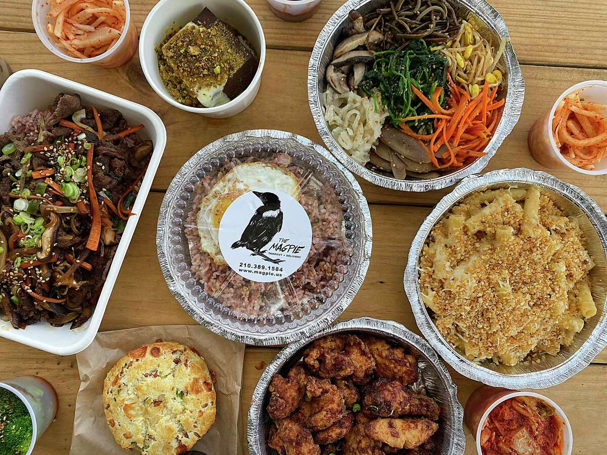 Takeout options at The Magpie in San Antonio include, clockwise from left, bulgogi, chocolate mousse, bibimbap with tins of vegetables and rice, macaroni and cheese and fried chicken with a biscuit.
