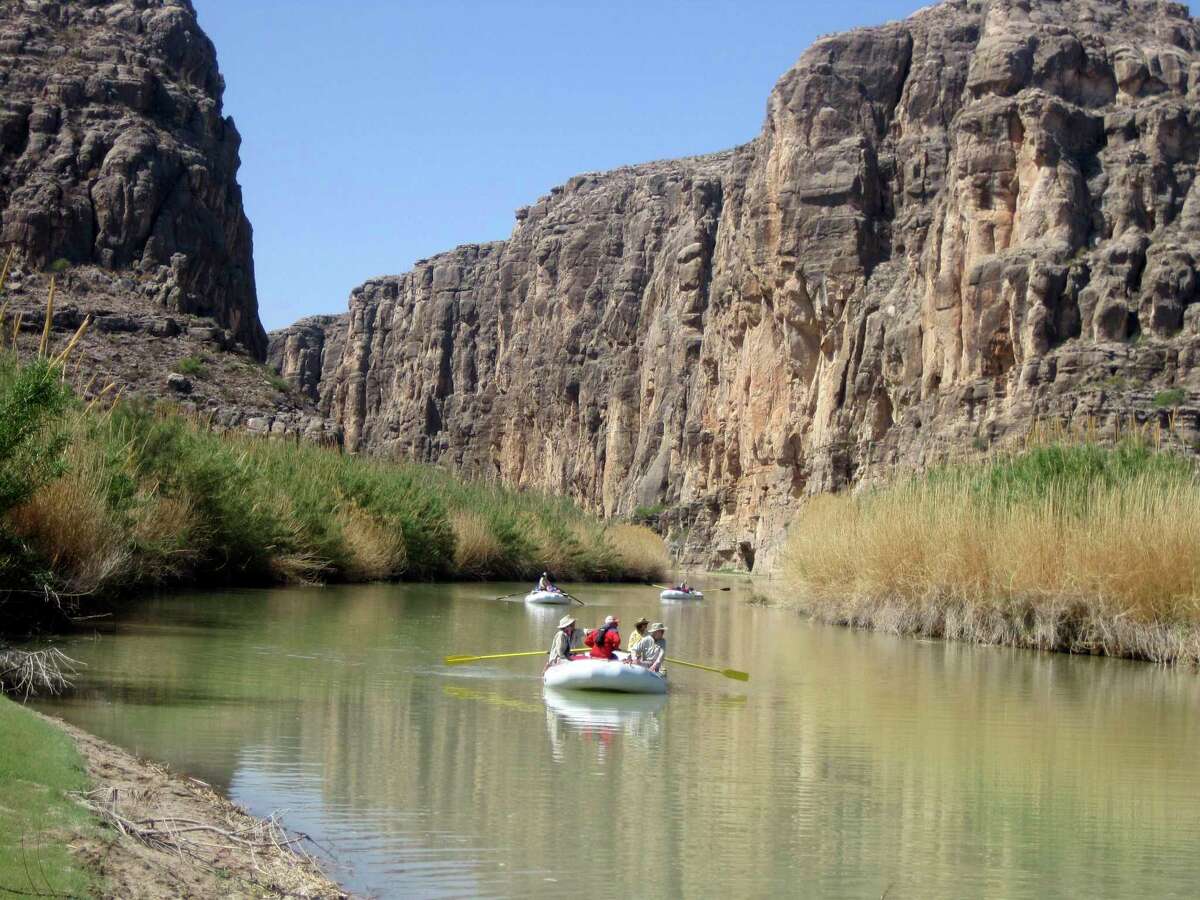 Rafts piloted by guides emerge from Heath Canyon, carved by the Rio Grande through Big Bend National Park in this 2011 photo.