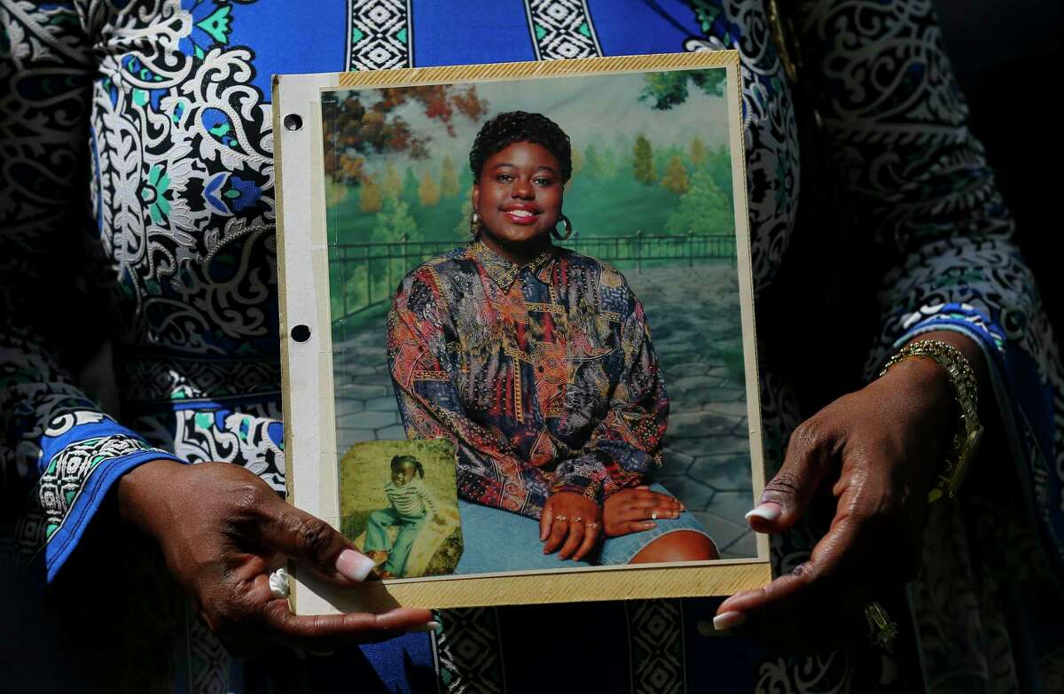 Antoinette Dorsey-James holds a picture of her sister Pamela Turner during a press conference outside the Harris County Civil Court Thursday, May 16, 2019, in Houston. Turner was killed during an altercation with a Baytown Police Department officer Monday night at The Brixton Apartments complex she lived at in Baytown, Texas.