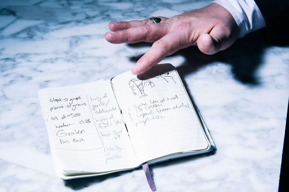 Mark Guillaudeu, beverage director at Commis' CDP Bar, points to a drawing of a cocktail concept in his notebook in Oakland, Calif. on Wednesday, March 4, 2020.