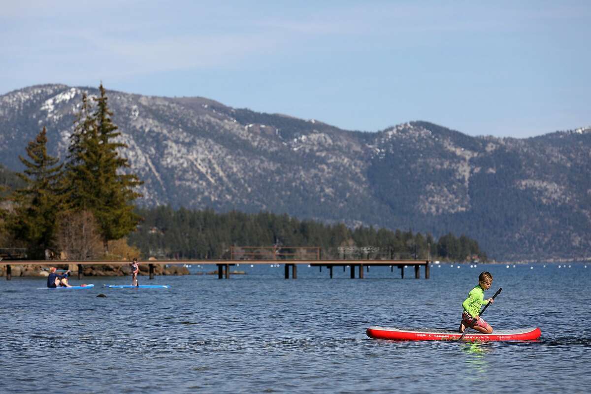 The latest reopenings are permitted in counties that meet certain COVID-19 benchmarks. All three counties in the Tahoe Basin — Placer, Nevada, and El Dorado — have qualified for regional variances and issued statements this week saying they will move into Stage 3 of the state's four-phase reopening plan. Because three counties make up the Tahoe region, each area is releasing clear guidelines and information online for visitors.  Truckee has a website listing open businesses for travelers, North Lake Tahoe has created an online readiness guide at gotahoenorth.com/knowbeforeyougo, and South Lake has a Health Travel Information page on its visitors' website.  These websites are helpful for overnight travelers, but the hope is that day travelers will consult them as well. "Someone just driving up for the day might not know our businesses are requiring masks," said Bowling of North Lake. "It’s important that people are recreating responsibly on trails and at beaches." The State of Nevada also runs along part of the lake and Travel Nevada has information for travelers. 
