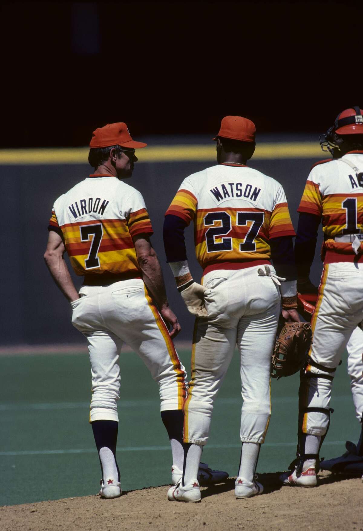 CINCINNATI - MAY 1979: Manager Bill Virdon #7 of the Houston Astros conferences on the mound with first baseman Bob Watson #27 and catcher Alan Ashby during a game in May 1979 between the Astros and the Cincinnati Reds at Riverfront Stadium in Cincinnati, Ohio. (Photo by Diamond Images/Getty Images)