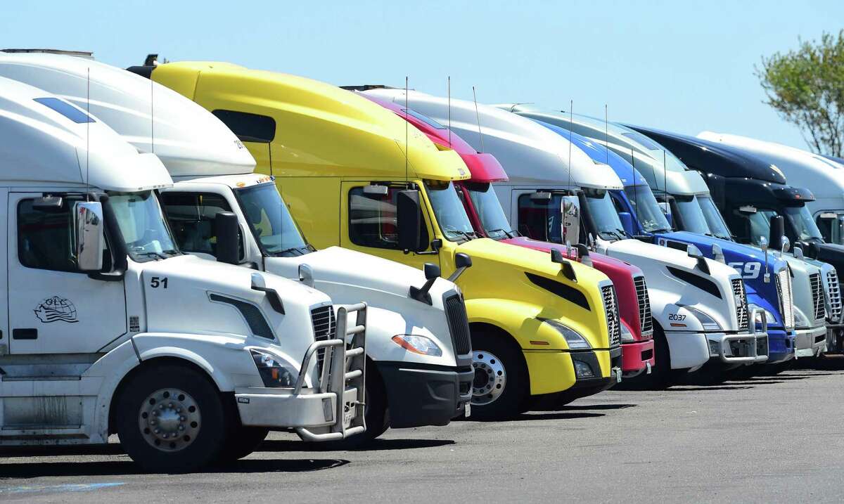 Trucks, here and below, parked at the Pilot Travel Center in Milford on Tuesday.