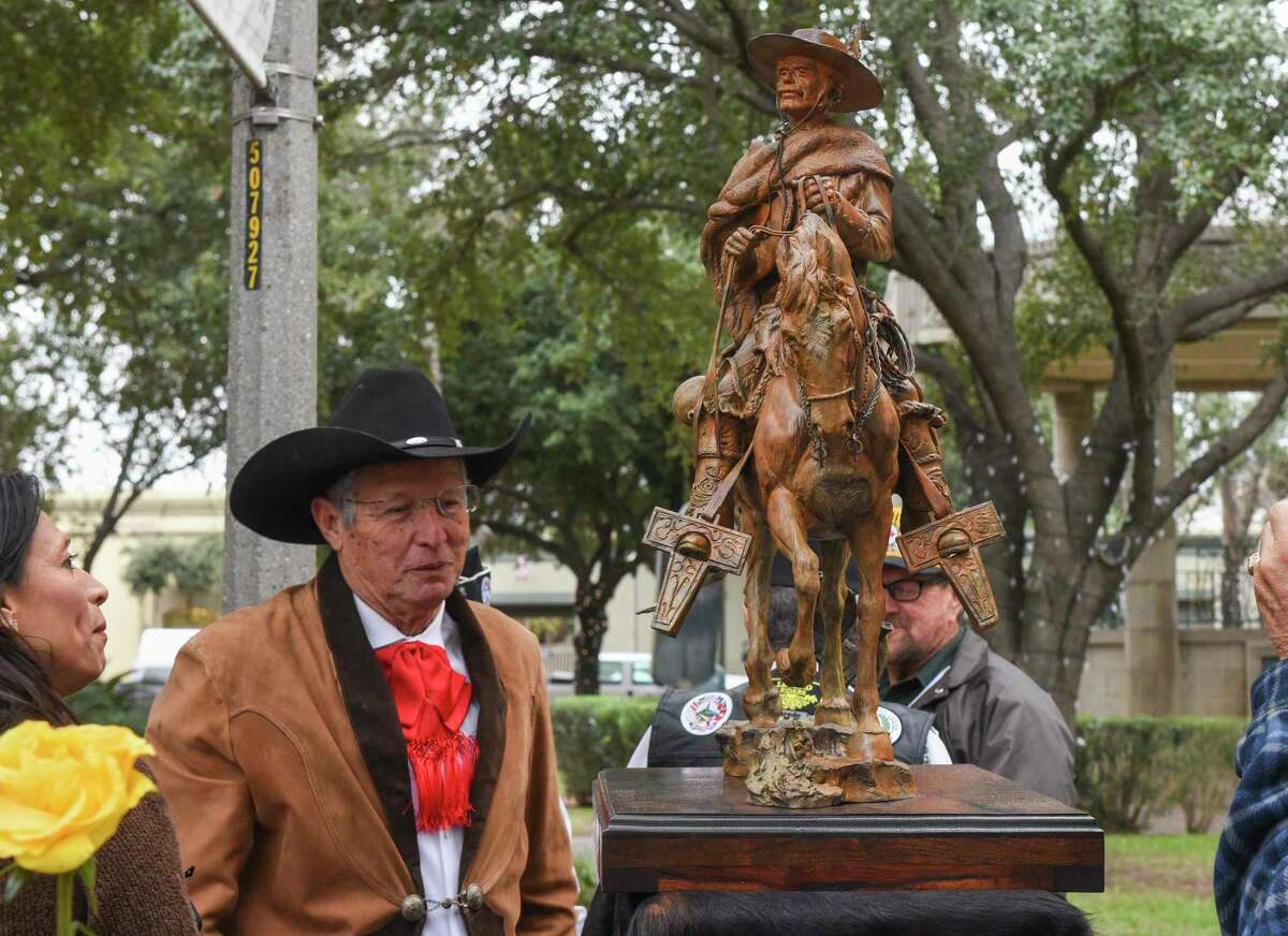 A statue maquette of Laredo’s founder Captain Tomas Sanchez sculpted by Armando Hinojosa, left, is unveiled, Saturday, Jan. 25, 2020, during an event celebrating the life of the city’s founder at San Agustin Plaza.
