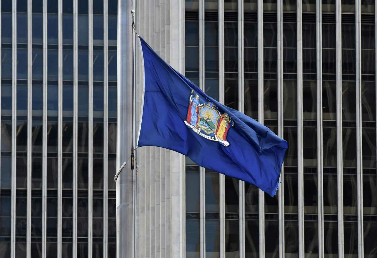 The New York State flag at Empire State Plaza is flown at half-staff during the coronavirus lockdown on Thursday, May, 14, 2020, in Albany, N.Y. (Will Waldron/Times Union)