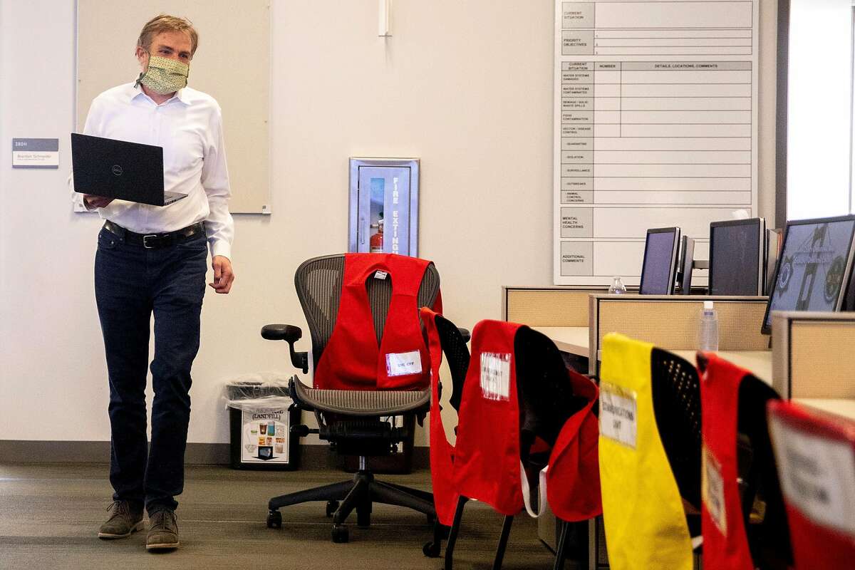 Marin County Health Officer Dr. Matthew Willis works inside the operations center at the Marin County Office of Emergency Services in San Rafael, Calif. Saturday, May 2, 2020. Willis recently recovered from a long battle with Coronavirus and is back to work.