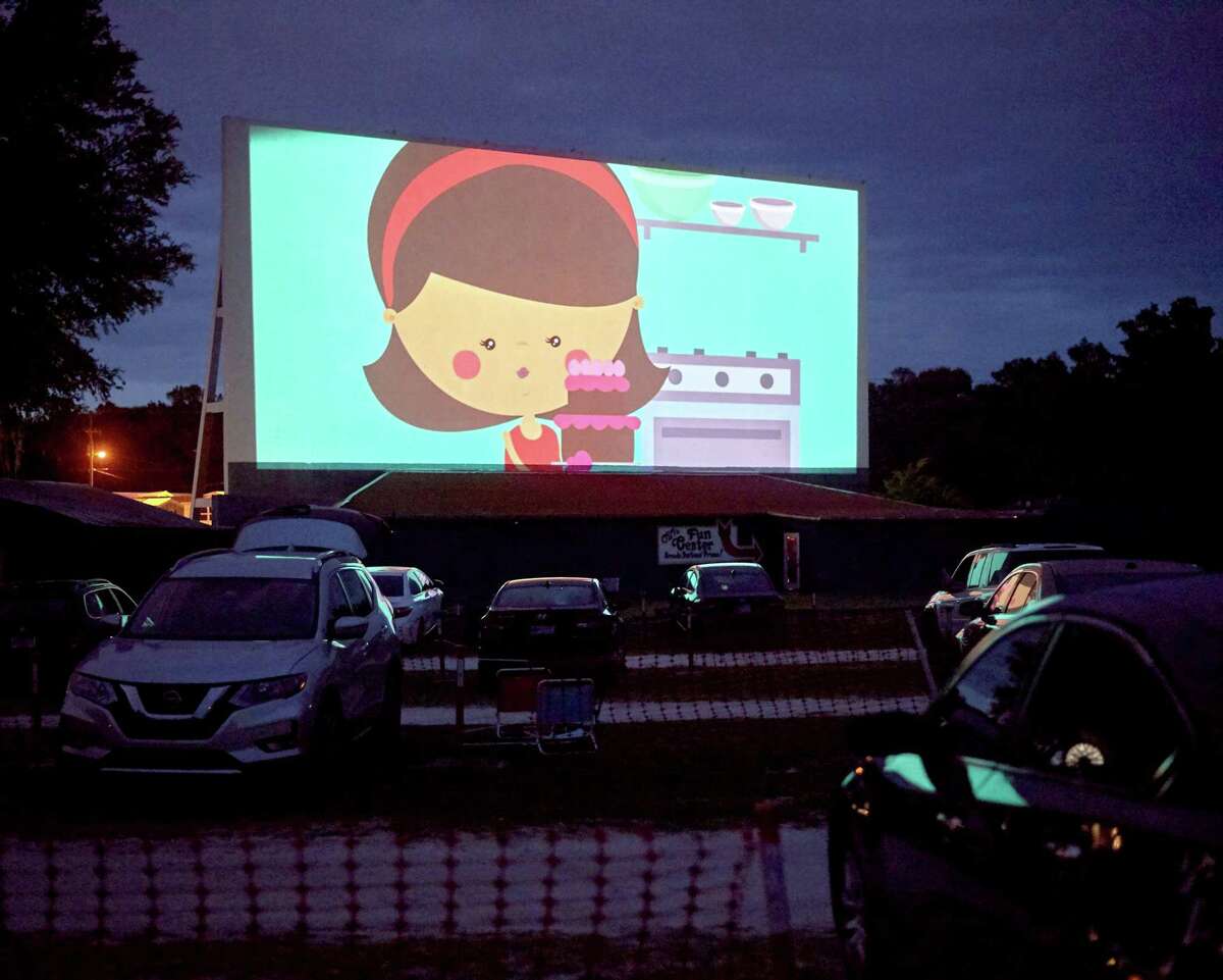 Movie-goers watch an animated short before the feature film at Ocala Drive-In Theater in Florida.