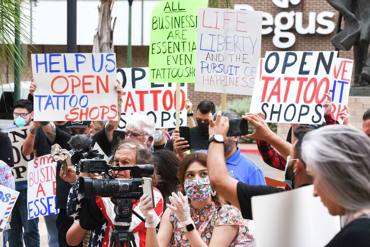 Protestors gather outside Laredo City Hall on Wednesday, May 13 during a freedom rally protesting decisions to shut down businesses amid the COVID-19 pandemic.