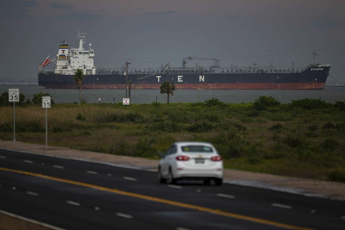 An oil tanker sits offshore between Galveston Bay and the Gulf of Mexico seen from Seawall Boulevard, Friday, May 15, 2020, off of the east end of Galveston Island.