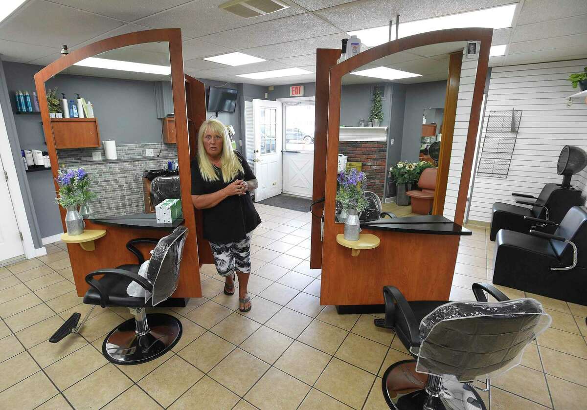 Jackie Dudek, who owns and operates Jackie's Styling Salon in Stamford, says everyone wants to reopen, but it's not safe yet. Dudek says she has to weigh losing clients to those that do open with keeping herself, her employees and her clients safe.