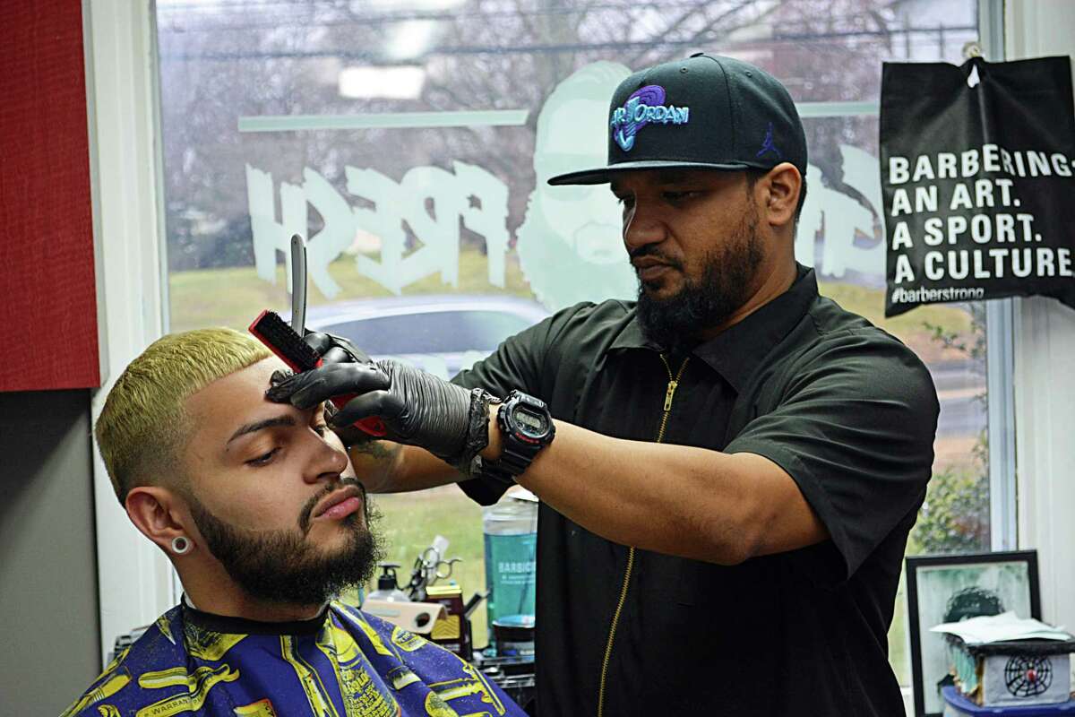 Joey Pelkey, 26, owner of Get Fresh Barber Shop at 131 Saybrook Road in Middletown, was chosen by Middletown Press readers as 2018 Person of the Year. On Monday, Lamont delayed the reopening of hair salons and barbershops to June 1, just two days before the scheduled restart.