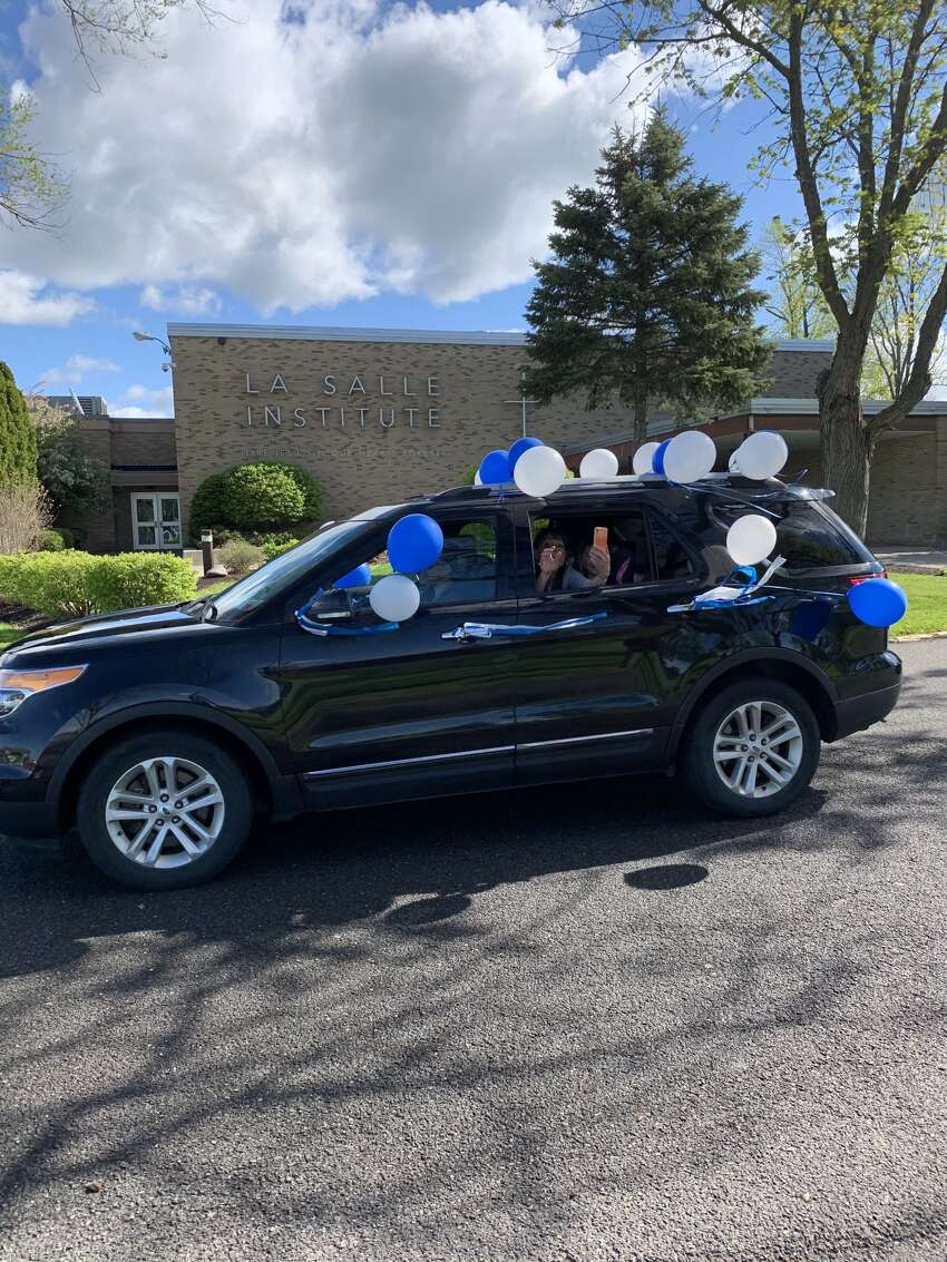 La Salle Institute faculty and staff gathered tin a socially distanced fashion to honor the members of the Class of 2020, on the day of what would have been the Cadets' formal graduation ceremony. Cadets and their families arrived at the La Salle Institute campus by car, and stayed in their vehicles as they heard an opening prayer and blessing from Campus Minister Ted Deeb, recognition of students by Vice Principal for Academics Matthew Michaud and remarks by La Salle Institute Principal Joseph Raczkowski.