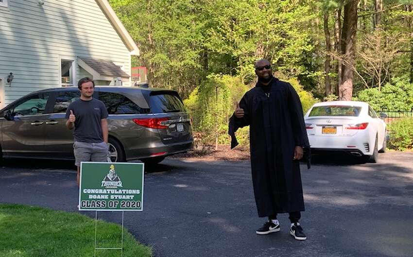 Doane Stuart Head of School Cecil Stodghill knocked on doors of the school's graduating seniors throughout the Capital Region on Saturday, May 16, 2020 to deliver a Thunderchicken sign and his personal congratulations.