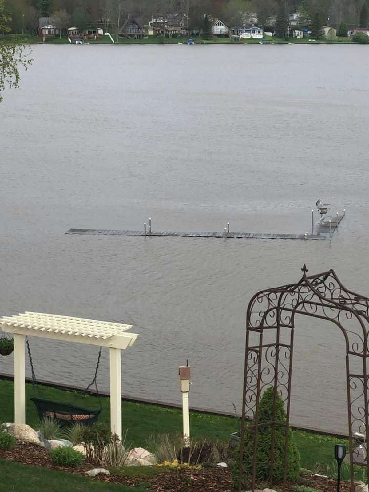 Readers submit photos after heavy rains in May 2020. Tina Marie Alwood saud: "Someone’s dock just floated by our house. 9:25am"