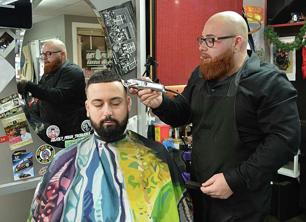 Joey Pelkey, 26, owner of Get Fresh Barber Shop at 131 Saybrook Road in Middletown, was chosen by Middletown Press readers as 2018 Person of the Year.