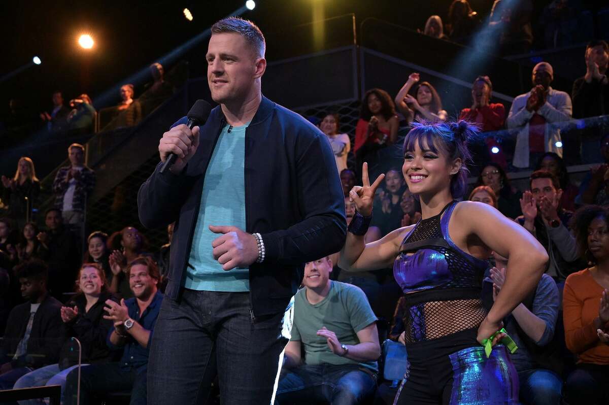 PHOTOS: A look at J.J. Watt off the field "Ultimate Tag" host J.J. Watt tries to stay focused as professional tagger Atomic Ant provides a distraction during filming of the Fox TV show, which debuts Wednesday. Browse through the photos above for a look at J.J. Watt off the field ...