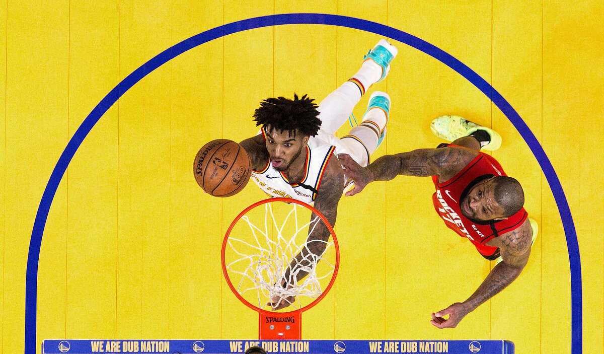 Marquese Chriss (32) goes in for a layup in the first half as the Golden State Warriors played the Houston Rockets at Chase Center in San Francisco, Calif., on Thursday, February 20, 2020.