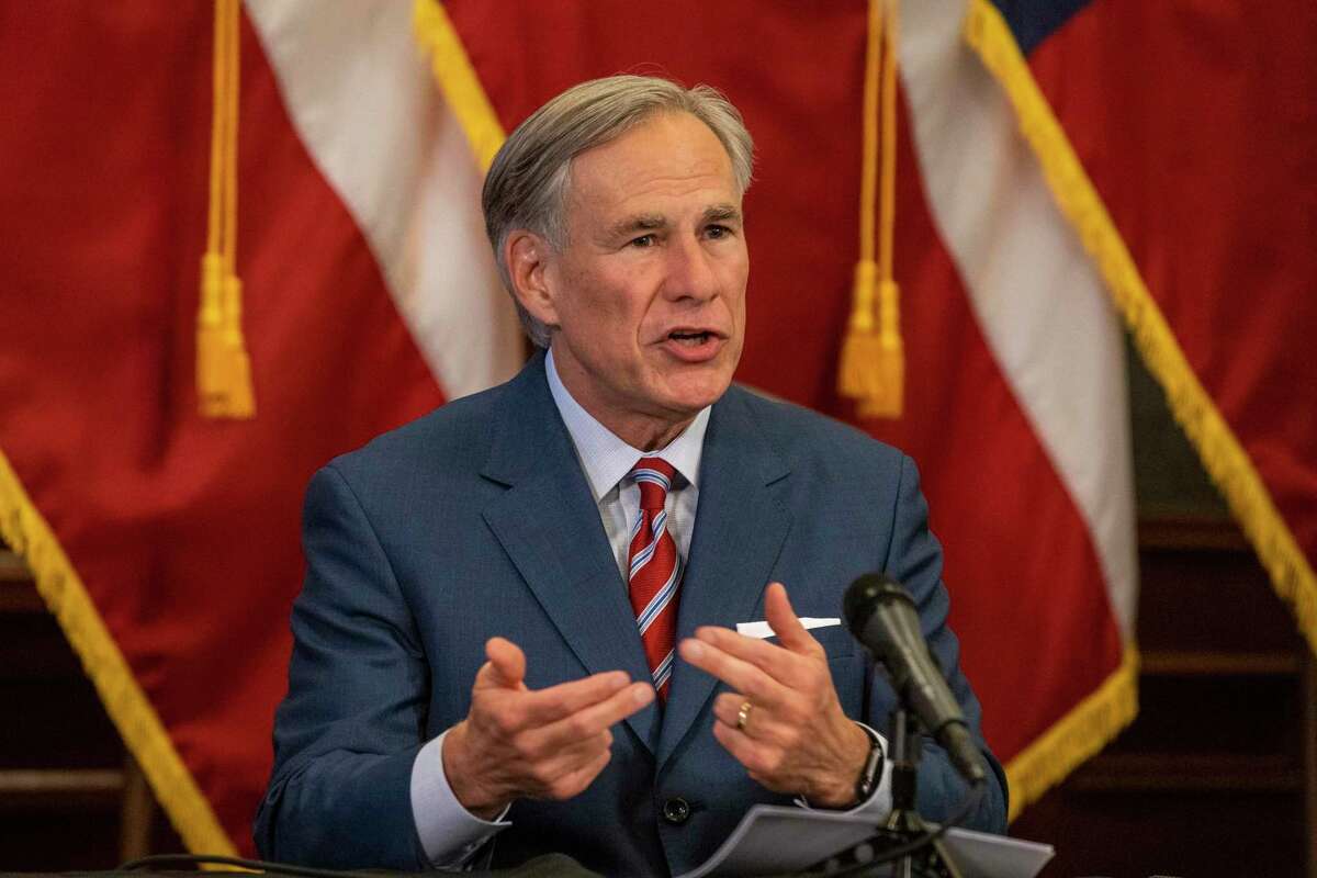 Texas Gov. Greg Abbott announces the reopening of more Texas businesses during the COVID-19 pandemic at a press conference at the Texas State Capitol in Austin on Monday, May 18, 2020. Abbott said that child care facilities, youth camps, some professional sports, and bars may now begin to fully or partially reopen their facilities as outlined by regulations listed on the Open Texas website. (Lynda M. Gonzalez/The Dallas Morning News/TNS)