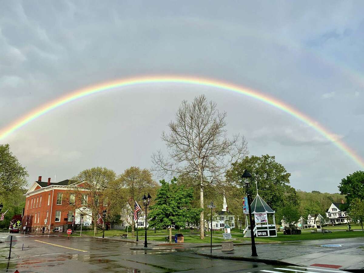 The beauty of the New Milford Village Green always seems to shine. But last Friday the town's downtown charm was magnified beneath a double rainbow that appeared after a rain shower.