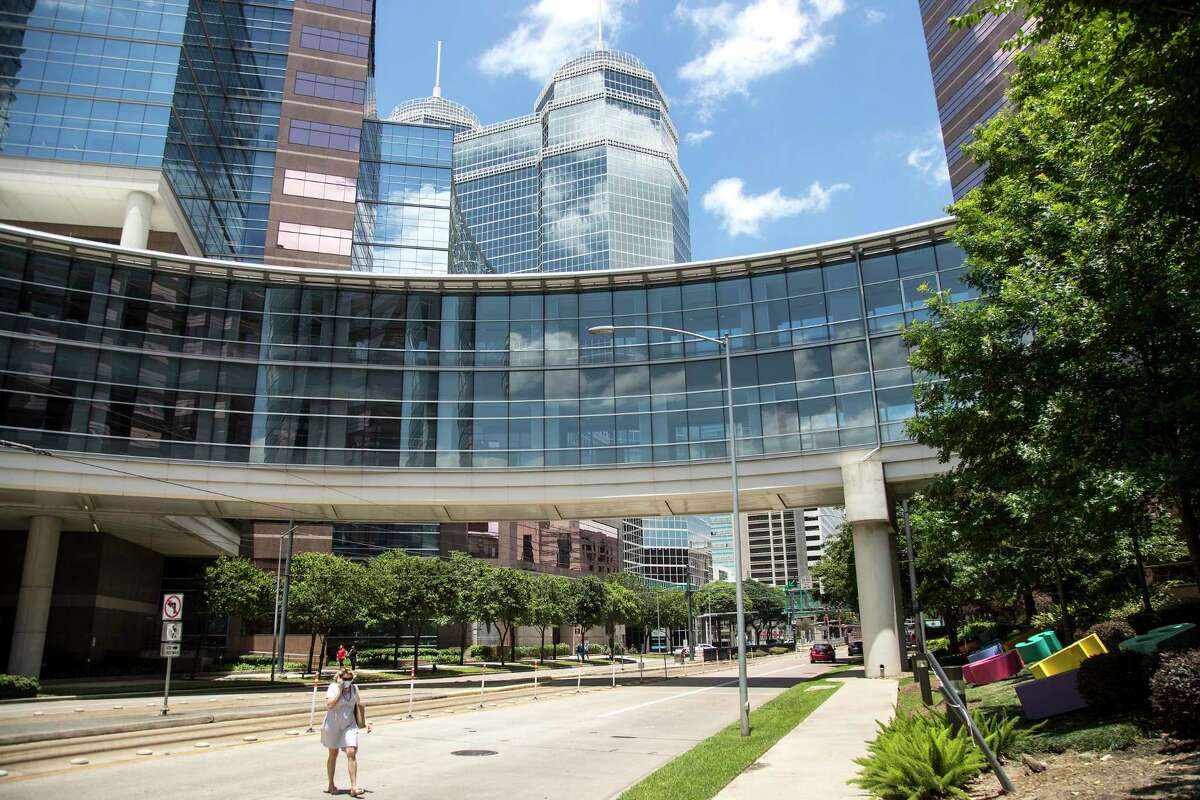 People move about the Texas Medical Center. Hospitals rank among the city’s biggest employers.