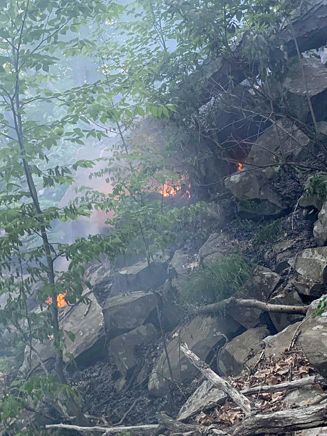 Firefighters battle brush fire in ‘dangerous terrain’ of Sleeping Giant