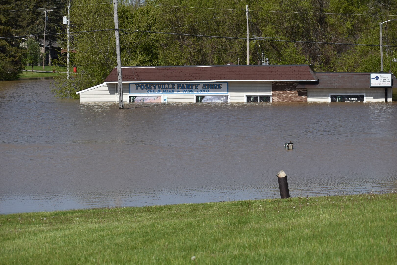Photos Damage to Poseyville Road due to flooding